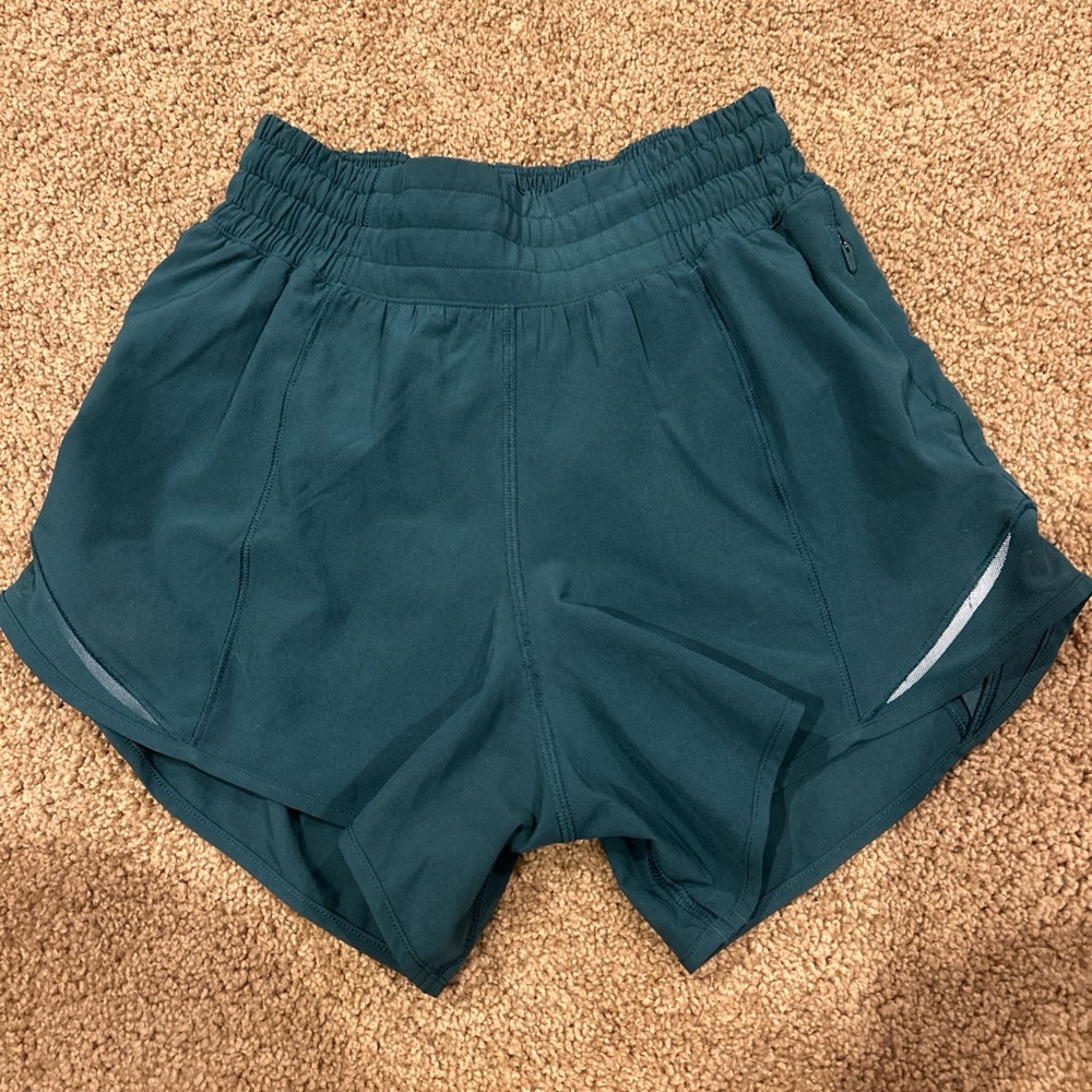 dark green lululemon hotty hots shorts